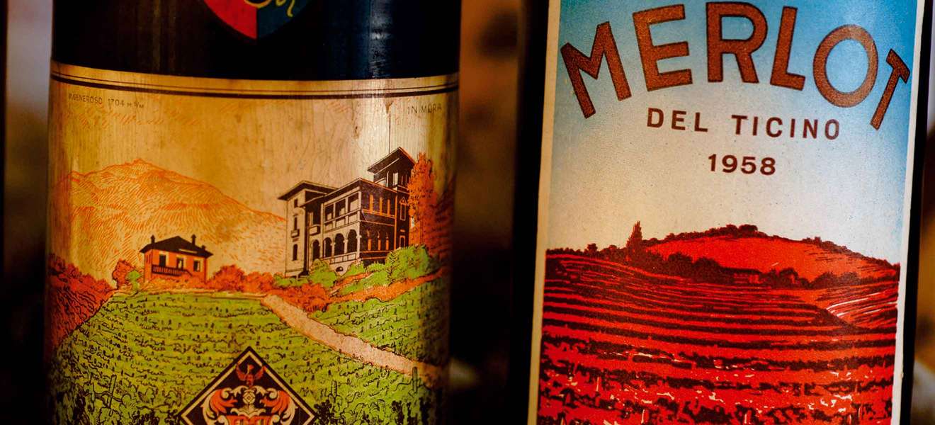 Flaschenetiketten aus der Frühzeit des Merlot. Der Merlot del Ticino mauserte sich ab den 1950er-Jahren allmählich zum wichtigsten Wein des Kantons. 